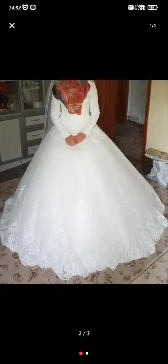 Dantel detaylı uzun kollu gelinlik