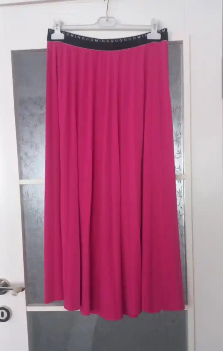 Pembe uzun etek