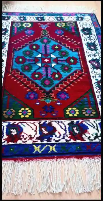 Desenli bordo antika el dokuma yün halı