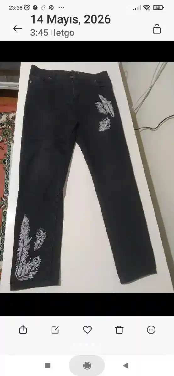 Yaprak desenli siyah kot pantolon ilan görseli