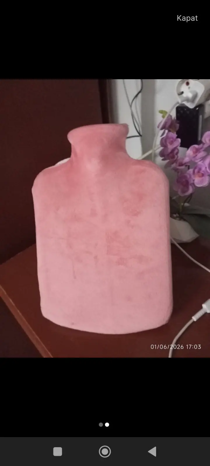 Pembe sıcak su torbası