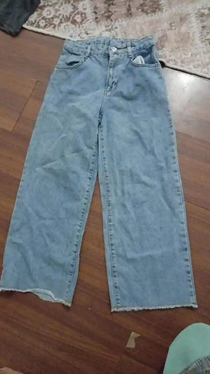 Yüksek bel geniş paça kot pantolon