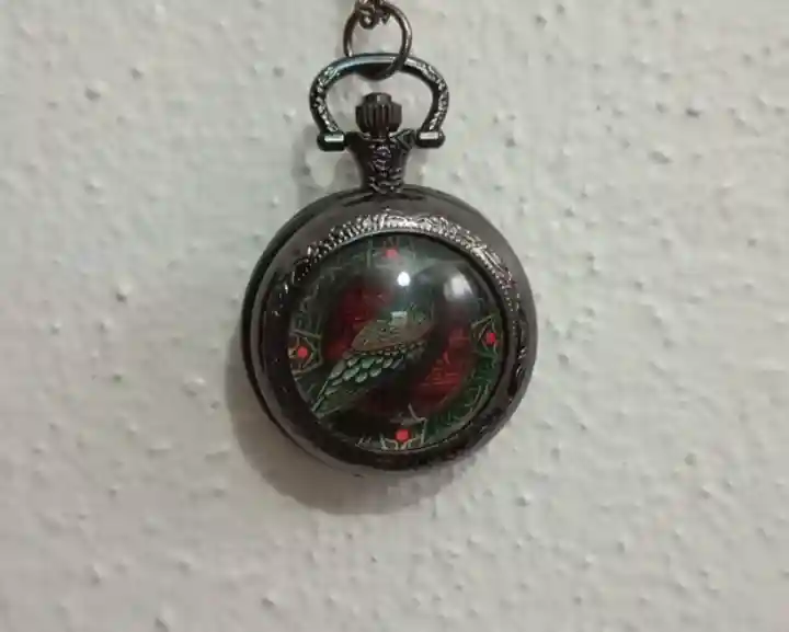 Antika cep saati, renkli kuş deseni