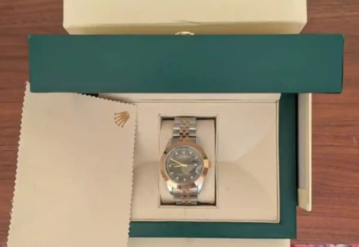 Rolex kasa ve metal kordonlu saat
