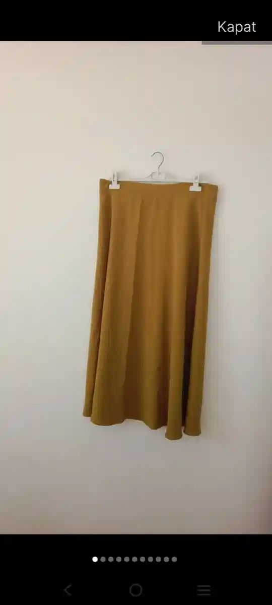 Sarı renk midi etek