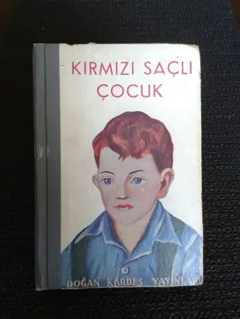 Kızıl saçlı çocuk..